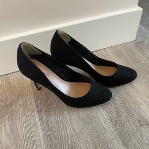 Black suede pumps